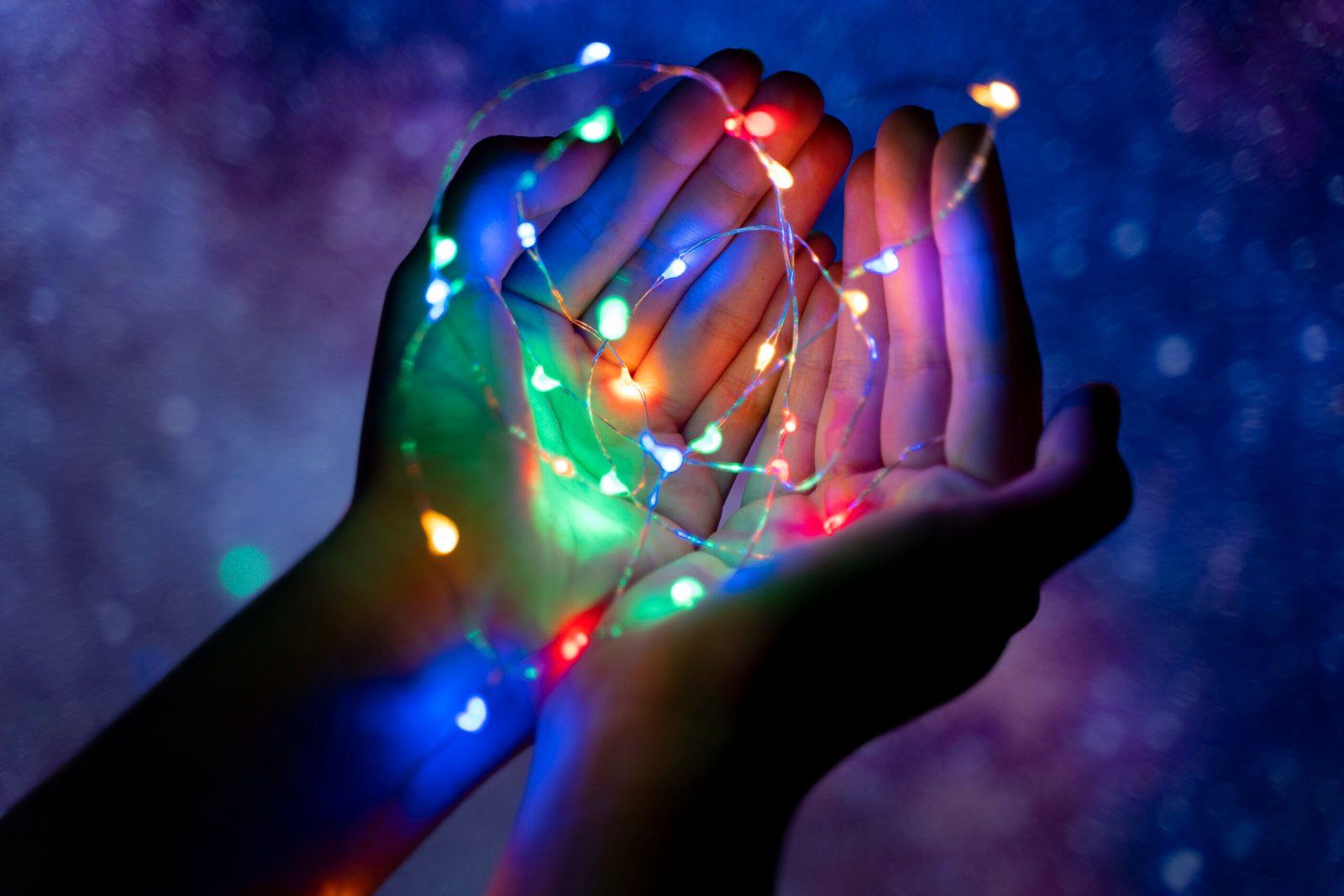 Trust and Mission - Hands holding tiny lights