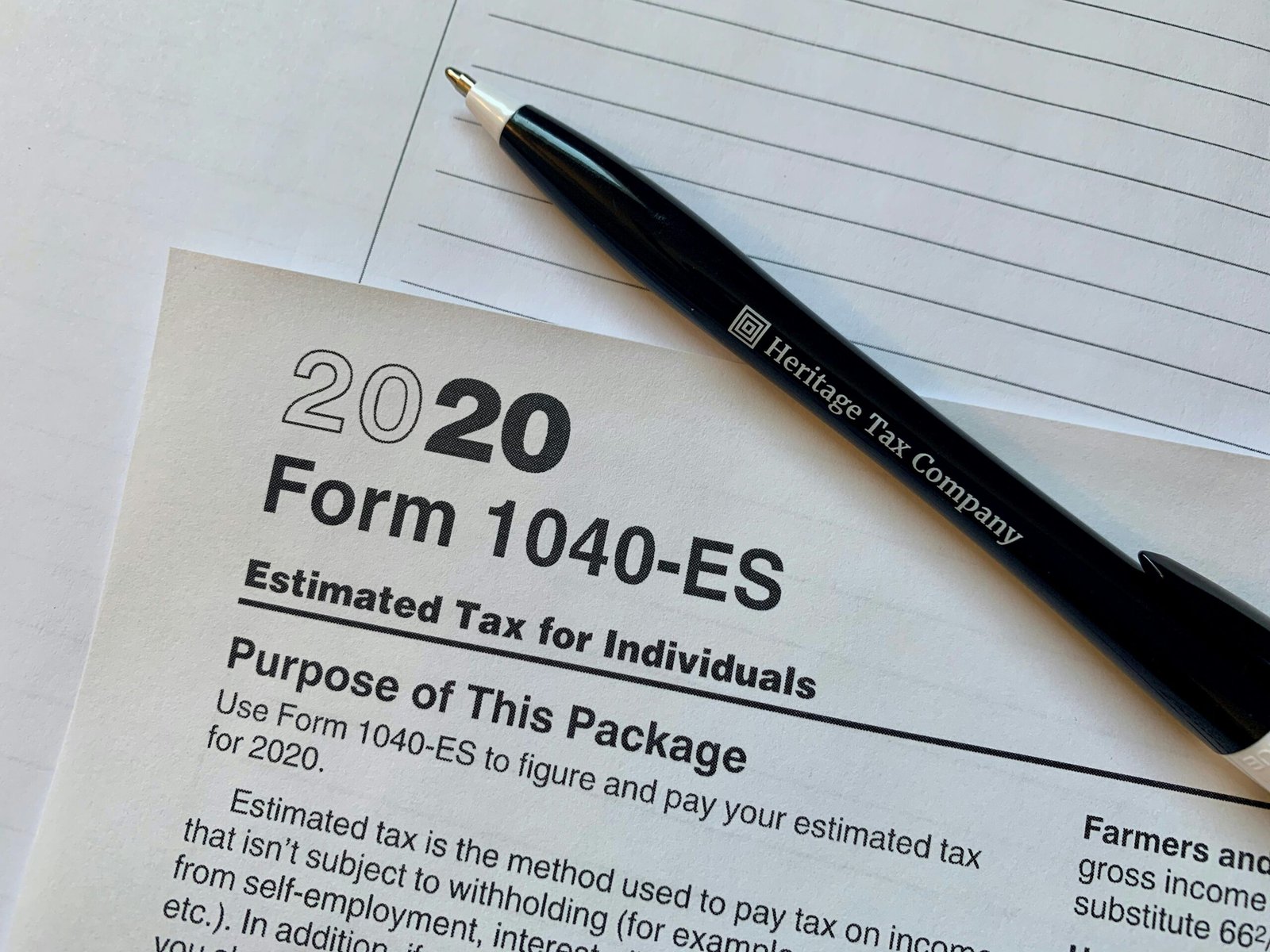 Self-employed taxpayer preparing IRS Form 1040-ES estimated tax payment